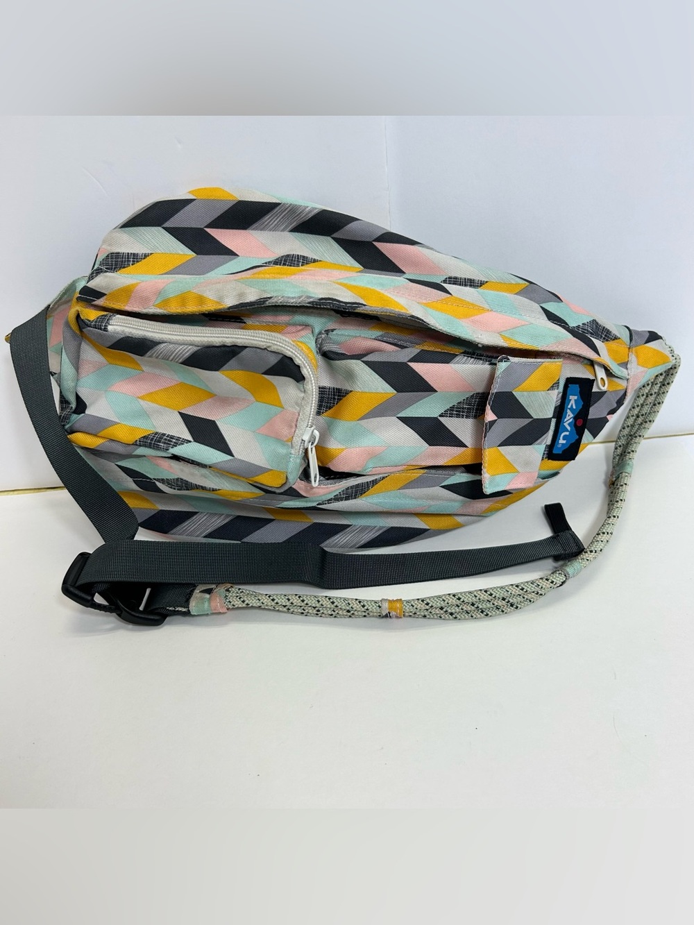 Kavu Geo Chevron Crossbody Sling Bag in Pink, Yellow, Gray travel hiking